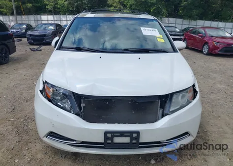 2014 Honda Odyssey Ex-L z USA, uszkodzony, nr VIN 5FNRL5H62EB008386